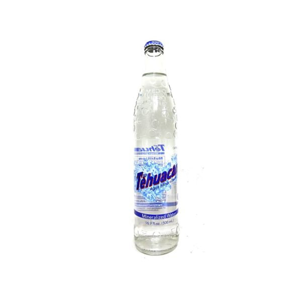 Clear bottle with blue label on a white background